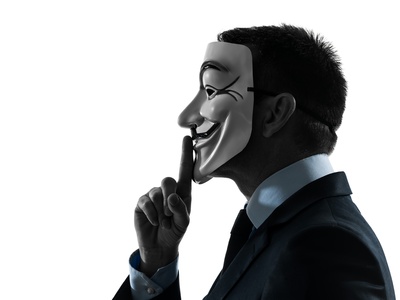 man masked anonymous group member hushing silhouette portrait